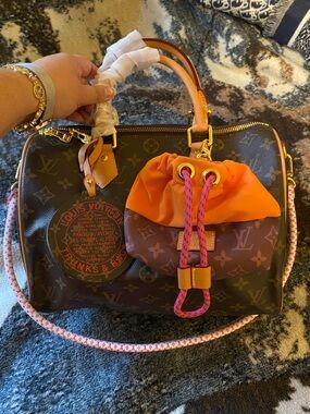 Louis Vuitton Monogram Satchel with Orange Drawstring Pouch